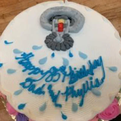 Birthday cake with blue icing script